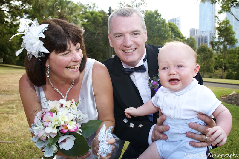 Bride and groom with baby - wedding photography sydney